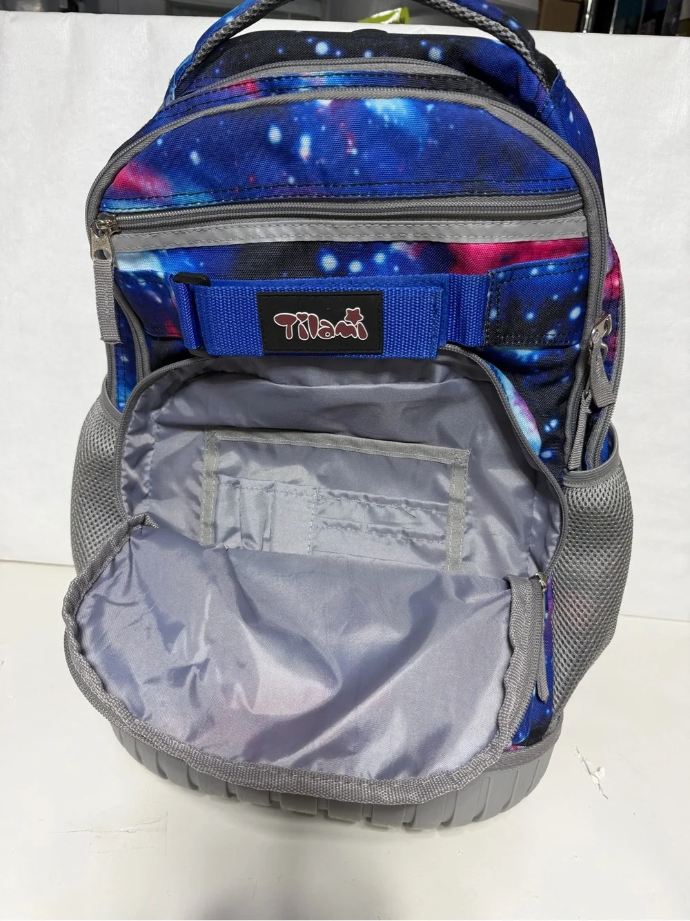 Tilami Deep Blue Galaxy Rolling Backpack 19 inch - pre owned condition